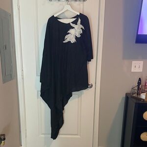 Elegant Black Asymmetrical Top with White Floral Detail